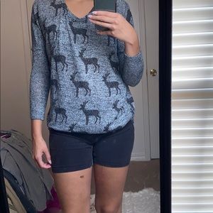 Sweater with reindeer decals